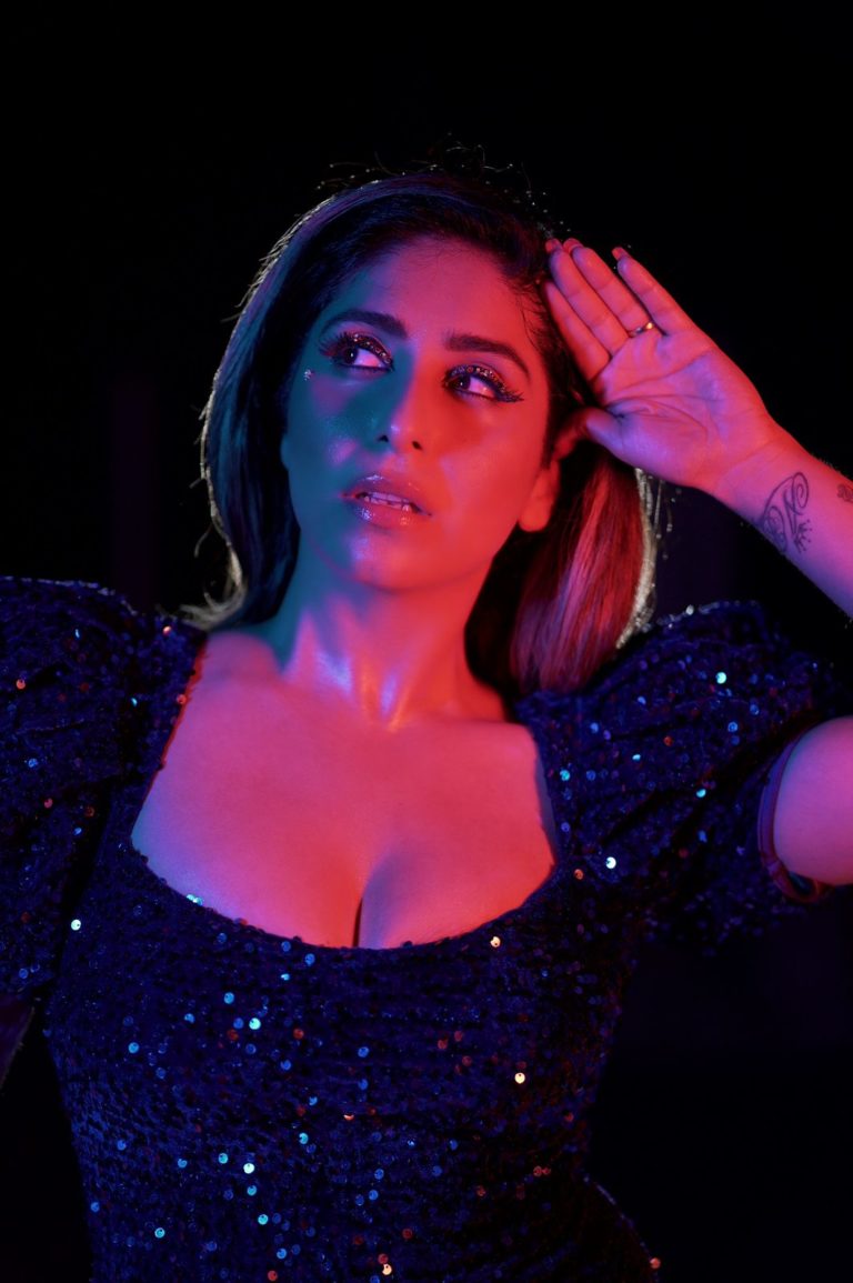 Singer-actor Neha Bhasin shares her exclusive Bold high slit shimmery blue gown with her fans