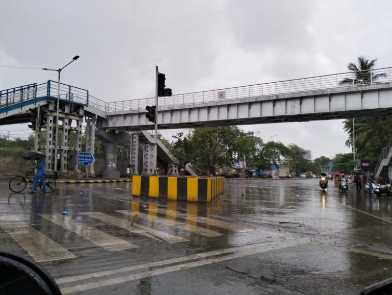 Heavy rain lashes Mumbai Waterlogging reported in many parts traffic and local train services disrupted,See Pictures here